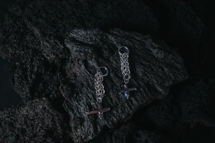 POLAR LIGHT CROSS SERPENT ERRINGS